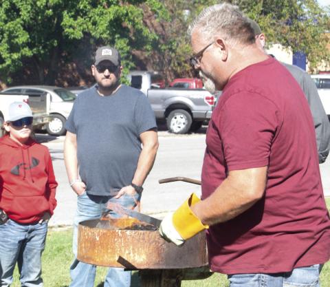There was a lot of interest in watching Knife Smith Phil Evans ply his trade at the forge. During the recent Columbus Days Festival Evans worked on the front lawn of the Columbus Museum where visitors watched him develop a new knife.