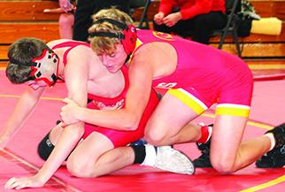 Jr. High Titan wrestling splits home double duels