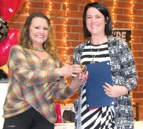 One of the Golden Apple winners at the 2018-19 presentation was Kelly Walters. The award is presented every two years to an outstanding teacher.
