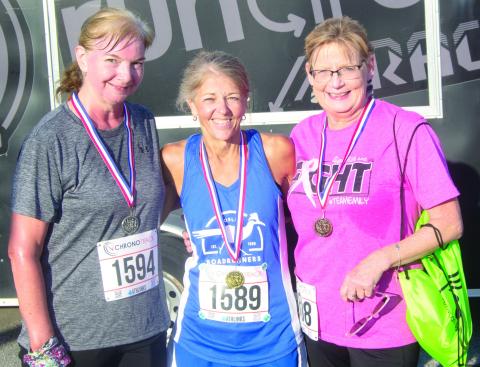 In the female 60 and over division finishing second was Janette Crain with a time of 45:05, first place was Kathy Ritchhart with a time of 28:54 and third place Sharon Carpino 51:39.