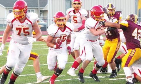 Trojans win clash with Titans