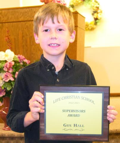 At the Life Christian School awards ceremony Gus Hall was presented awards for 3000 Club, Penmanship and PACE Neatness, Green Dot, Highest Grade Point Average, Most 100-percents, Privilege Levels 15C/A, Pastor’s Honor Roll and Christian Character Award: Diligent.
