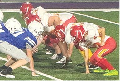 The Columbus Titan B Team offensive line faces off with the St. Mary’s-Colgan defensive line in their season opener at Hutchinson Field in Pittsburg, Tuesday, against the St. Mary’s-Colgan Panthers. Colgan came away with wins in the A Team game, 26-0, and the B Team game, 22-6. Columbus hosts Baxter Springs for their home opener, Thursday, at Titan Stadium. Courtesy photo.