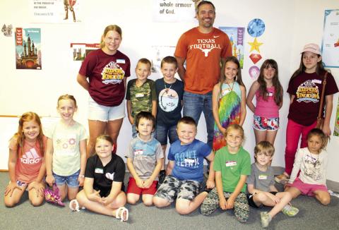 Vacation Bible School at Center Christian Church had a good size turnout. Pastor Andy Peterman (orange shirt) and joined the first and second grade “Fantastic Falcons”. Each day children had a chance to learn Bible stories, sing, play games and have a themed snack.