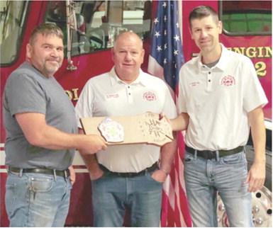 Jason Allison, faithfully served the Columbus Fire Department for 33 years. Jason stepped down earlier this year. He was presented with a plaque to show the department’s appreciation for his decades of dedication and service. Assistant Chief Steve Burton and Chief Steven Burton presented the plaque. Photo courtesy Columbus Fire Department.