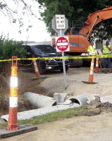 Columbus City public works crews while preparing for the Safe Route School sidewalk reconstruction project found it necessary to replace storm sewer pipes. The current project is near the corner of Vermont Street and Country Road. Three large pipes converge at the corner and carry the storm water to Brush Creek. All of the pipes from the corner to the creek will be replaced.