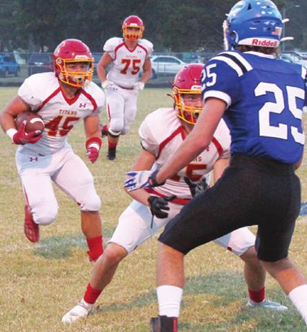 Titans halt Chargers in district win