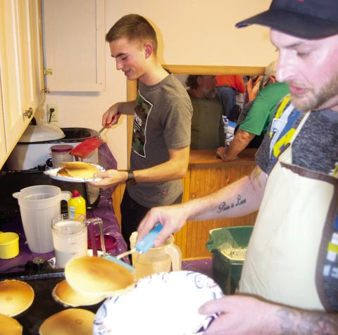 Eli Burkhart and Zach Garner were the grill jockeys at the Neutral Church pancake and sausage dinner. The large crowd kept the grills going until closing time.