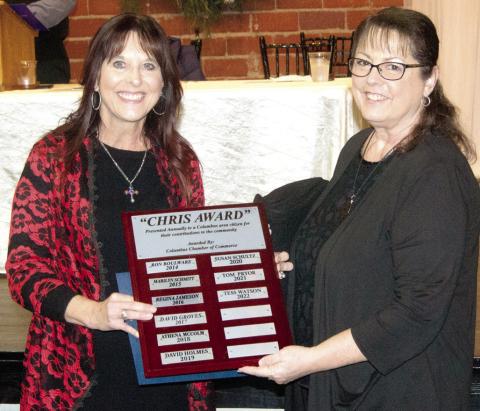 Chris Award recipient Tess Watson was presented her Chris Award by Columbus Chamber Ambassador Committee Chairperson Sonja Duley.