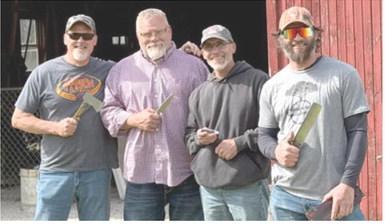 Four Columbus knife enthusiasts were prize winners at the recent Kansas Custom Knife Makers Association meeting on April 19th at the Dickinson County Heritage Center in Abilene. Todd Murdock the unofficial best ax award, Phil Evans best hunter award and best of show, Mike Pace best folder and Kurtis Baylor won the best knife competition and the cutting competition. Courtesy photo.