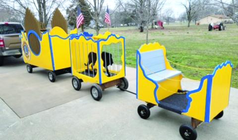 Getting ready for the upcoming Columbus Day Parade, the Lions Club will show off their new float. Columbus Lions Vice-President Brad Gleason repaired the circus wagons which were donated to the Columbus Lions by the Oswego Lions Club a few years ago. The wagons will make their inaugural appearance in the Columbus Days parade this year.
