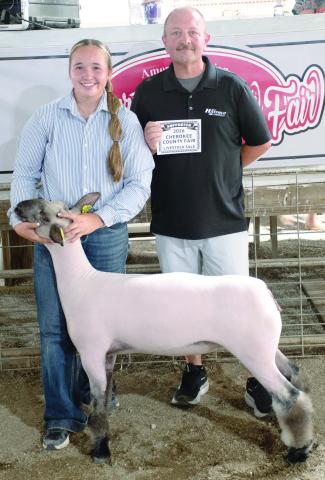 The Grand Champion sheep shown by Kynlee Sommer, Spring Valley Sparklers, was purchased at the premium auction by Jay Hatfield Auto Group represented by Brian Wellmeier.