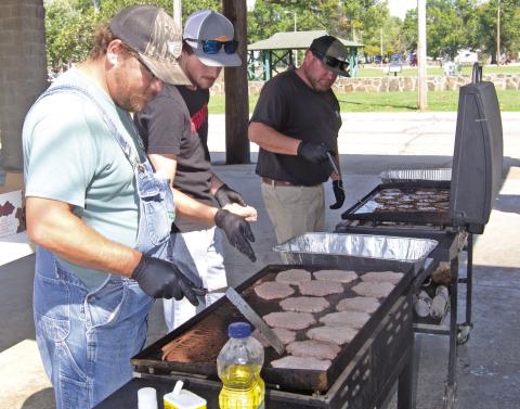 Farmers Coop employees turned into volunteer cooks to prepare the hamburgers for Appreciation Day free lunch for area Veterans and First Responders. Honoring our community heroes, Cooking were Trevor Brown, Owen Roberts and Casey Roberts.