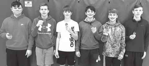 The Central Junior High School Eighth Grade Basketball Team received medals Tuesday morning (above) for earning the distinction of CCCJL Co-Champions for the 2021 regular season. Carter Henry, Kyler Rahmeier, Jace Midgett, Jack Vilela, Syler Schuberger, and Brandon Stice collected their hardware at the Central New Gym. Seth White is not present. Courtesy Photo.