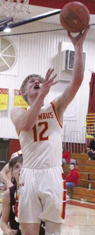 Titan Junior, Cole Youngblood, scored eight of his team-high, 17 points in the third quarter of the 6227, win over St. Paul, Tuesday, at the Columbus High School Gymnasium.