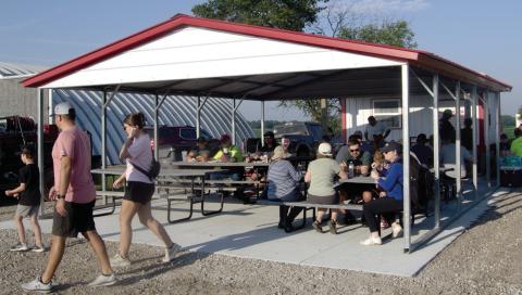 A new building has been erected at the Oswego Airport, located 10 miles west of Columbus The new construction includes rest room facilities and a covered building for meetings. The building was used recently where breakfast and lunch was served for the annual fly-in.