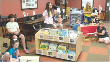 Keeping youngsters busy and connected with the Weir Library through the summer brings out some unusual ideas. Thursday morning the Cherokee County Extension personnel demonstrated the connection between soil and food.
