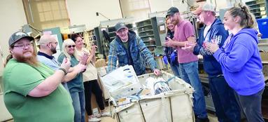 Martin White officially retired from the Postal Service on Sunday