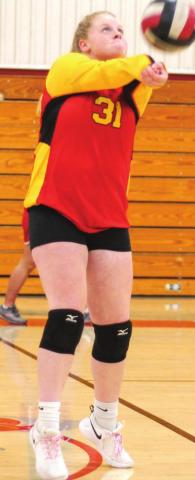 Lady Titan Freshman, Madisen Rand makes a pass during the volleyball team’s inter-squad scrimmage, prior to Titan Booster Club’s Annual Meet the Titans Night, August 24, in the Columbus Unified High School Gymnasium.
