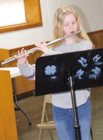 During Cherokee County 4-H Days, Ryleigh Holmes performed a flute solo for the judges. She was accompanied by Gae Phillips on the piano.