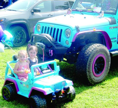 A matching pair of Jeep vehicles were attending the Jeep Invasion in Baxter Springs Saturday as Ivy Barnard and Dottie Pritchard were driving the smaller version. In keeping with the event. One of the events was a kiddie car show featuring Jeeps.