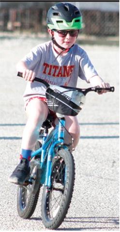 Brody Eaton finished the Back-to-School 5K course first, Saturday, in the fundraiser benefiting the USD 493 Parent/Teacher Organization. Brody won first prize in the Bike division of the event.