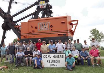 Retired coal miners and their families converged on Big Brutus June 3 for the annual miners reunion. Food, visiting and story telling were on the agenda for the day. Retired miners enjoyed fish and side dishes as they reconnected and reminisced with buddies. Big Brutus was one of the largest electric shovels used to surface mine coal. The shovel has become one of the top tourist attractions in Southeast Kansas. Photo by Emmett Sullivan.