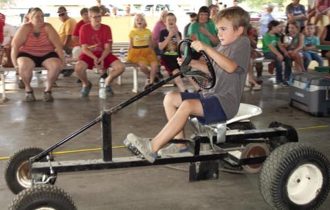 Tractors used in the pedal tractor pull vary depending on the age of the entrant. Older children get to try their hand at this tractor. Winners in each division have the opportunity to compete at the Kansas State Fair.