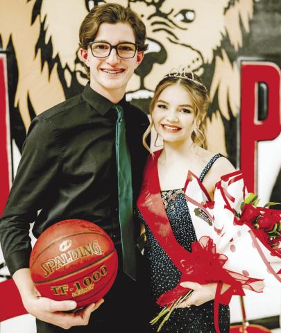 Homecoming games at Baxter Springs were Friday night against Frontenac. Paul Pommier was chosen King and Lillian Weston was crowned Queen between games. Courtesy photo.