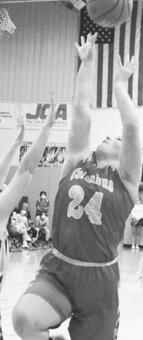 Lady Titan Senior, Bailey Monroe, goes up for a shot in the Class 3A Sub-State loss at Cherryvale, 57-34, Monday night. Columbus was eliminated from the tournament, ending their season.