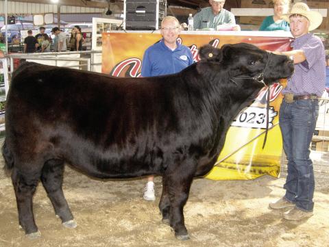 For the second consecutive year Cole Youngblood, a member of the Columbus FFA, showed the Grand Champion Market Beef at the Cherokee County Fair. He received $5,500 in premium from Crossland Construction, represented by Brad Wells. This is the fourth consecutive year Crossland has purchased the premium on the champion market beef.