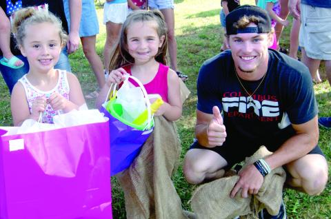 Freedom Fest sack race competition in the girls under six division Kynedy Duley was first and Emersyn Carter was second. Austin Hoiser the starter and judge presented the prizes to the girls.