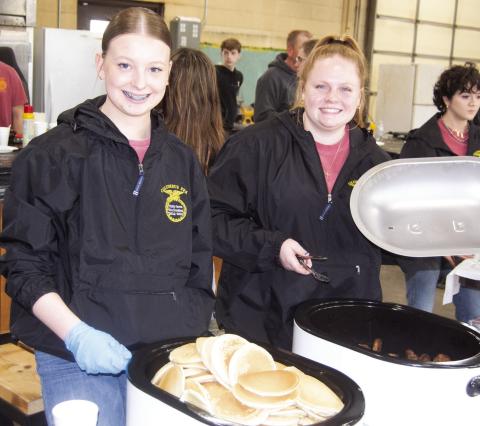 National FFA week was celebrated Thursday morning with a pancake and sausage breakfast in FFA shop at Columbus High School. The students served approximately 150 visitors pancakes and their Blue and Gold sausage. Trinity Green and Madisen Rand were serving the visitors.