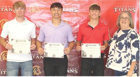 Hunter Ruddick, Jayden Rodriguez and Cal Saporito, CUHS Seniors, received recognition of achievements for the Crossland Kickstart Program from Marta Brown, Crossland Representative during the Senior Assembly, May 15, at the Columbus Unified High School Gymnasium.