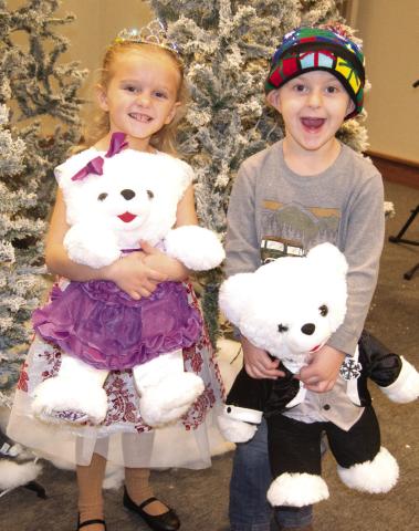 Baxter Springs Little Miss Holiday Raegan Tanner, 5, and Little Mister Holiday, Lucas Sandefer, 3, were crowned Saturday, December 2 and received the teddy bears and crowns. The youngsters were in the Christmas Parade later in the day. The youngsters raised a total of $3,257 in ticket sales.