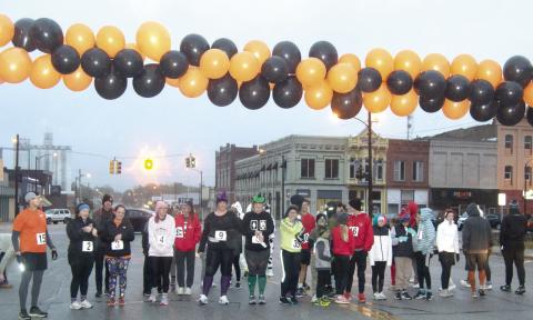 At the annual Titan Band and Team Threads Zombie 5K 45 contestants lined up at the start line despite the gloomy weather.