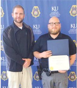 Marcus Harmon-Tsinhnahjinnie, 2015 graduate of Columbus Unified High School, recently graduated from the Kansas Law Enforcement Training Center. He is currently employed by Columbus Police Department. Sgt. Kyle Clark attended the graduation ceremony. Courtesy photo.