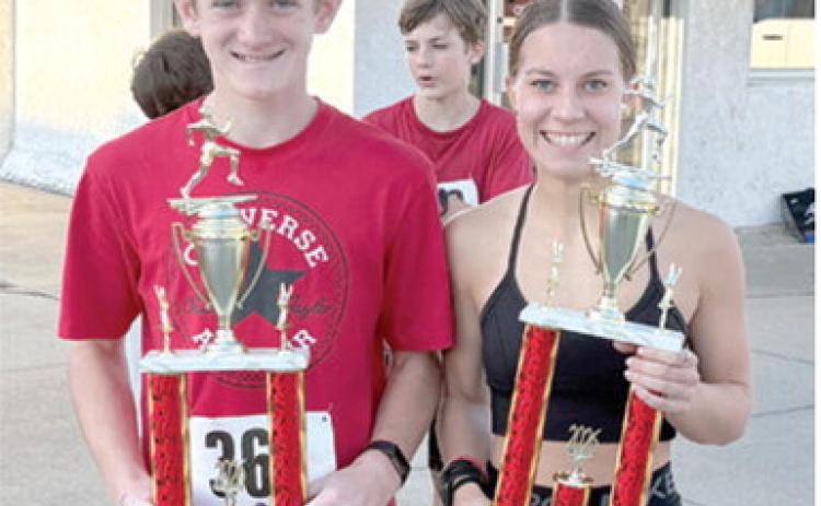 The event that always kicks off Saturday of the Columbus Day Festival is the annual 5K run. This year, the top two overall winners in the Columbus Day 5K were both in the 19 and under age division. Awards presented according to age groups and gender divisions. Lydan Atkinson, 13, had a time of 21:11 and Grace Grant, 17, came in with a time of 24:49. Courtesy photo.