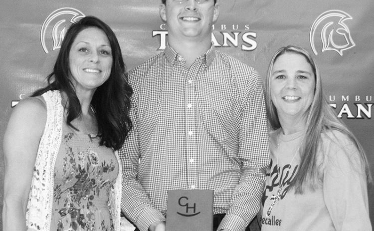 Cole Minor received the Callie Henson Memorial from Angel Tate and Ryan Lacen, Henson Family Friends, in the amount of $500 during the Senior Assembly at the Columbus Unified High School Gym, May 19.