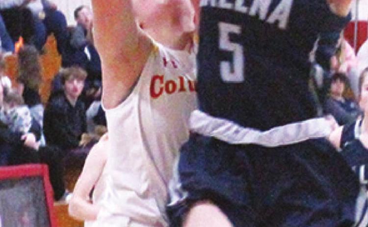 Lady Titan Freshman, Katy Mooney, is fouled by Lady Bulldog Freshman, Rylee Boyes, in the fourth quarter, Tuesday, at the CUHS Gym. Katy made both free throws to keep Columbus in the lead 28- 25. Galena ended up with the win, 38-36.