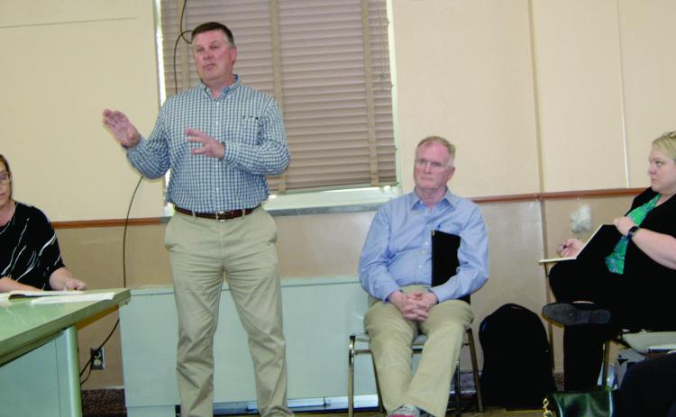 Executives from the Department of Transportation visited with Cherokee County Commissioners and residents Monday morning. The discussions centered around the construction of US69 four-lane highway through Cherokee County.