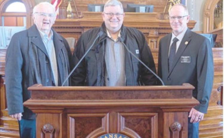 During City Government Day at the Kansas State Legislature, Columbus Council member Tom Pryor and Mayor Grant Spieth visited with State Representative Dale Helwig during a break in the session.