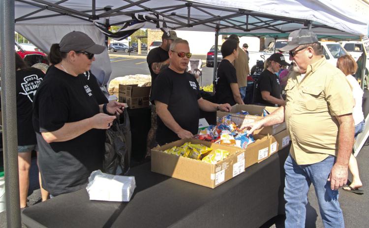 The Baxter Springs Police Department Reserve Officers, in conjunction with the Cherokee County Sheriff’s Department Reserve Deputies held a Back the Badge Event earlier in October. Large crowds enjoyed the Bar -B-Q pork sandwiches.