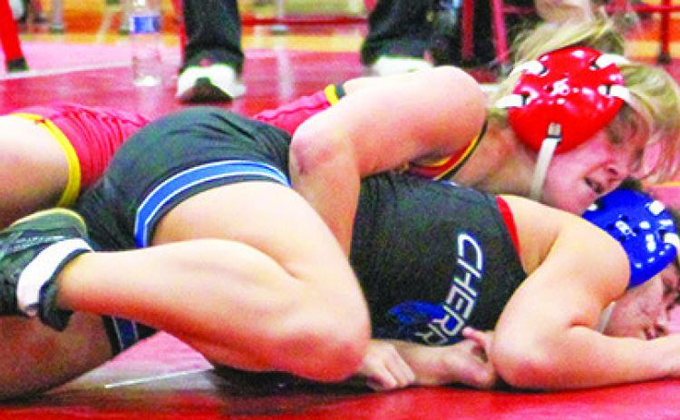 Lady Titan Freshman, Tatum Kirk, won five matches with one forfeit in the Columbus Duals, Friday at the CUHS Gym.