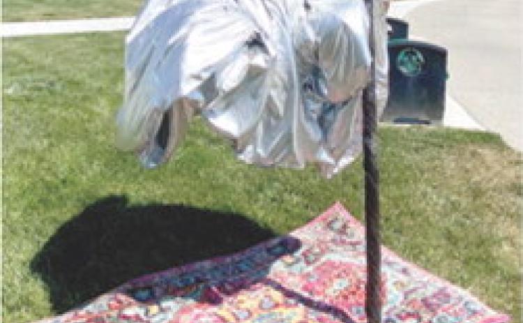 Erin Wilson, also known as Erin the Extraordinary, will be performing during Columbus Day. She is a stiltwalker and also has living statue acts. Courtesy photo.