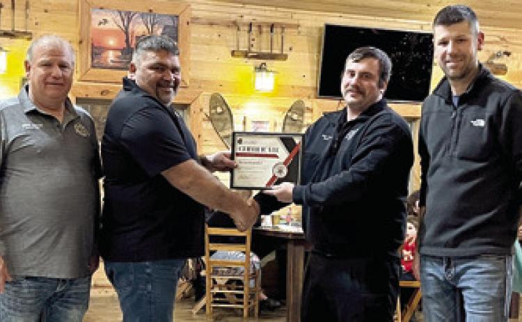 At the annual Columbus Fire Department Christmas party, firefighter/driver Dylan Koehler received a Certificate of Excellence from Assistant Chief Steven Burton Sr., Deputy Chief Jason Allison and Chief Steven Burton. “Dylan being a new member stepped up and maintained one of the highest percentages for attending emergencies this year. He was always there when we needed him no matter the time,” said Chief Burton. Courtesy photo.