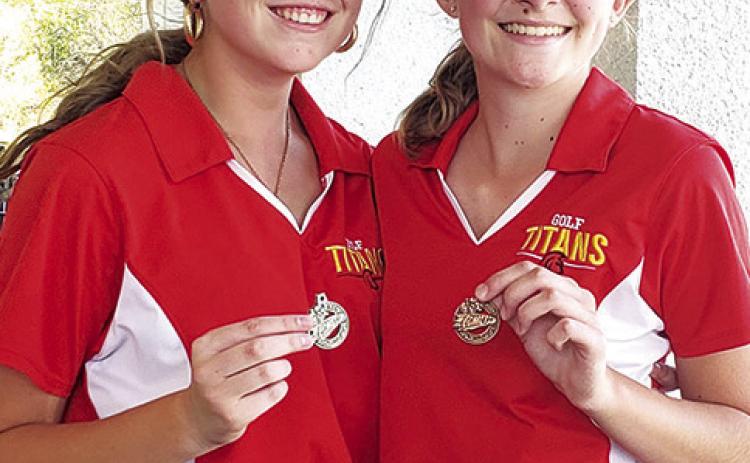 Lady Titan Junior, Reese Grundy placed second in the Chanute Varsity Invitational, Monday. Lady Titan Sophomore, Mallory Thompson, placed third in the field of 42 golfers. Courtesy Photo.