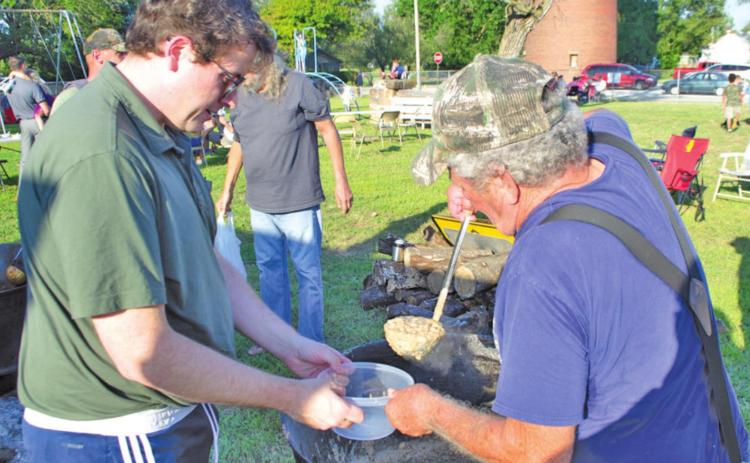 Don Alexander has been at the bean pot in Weir for the past nine years on Homecoming Week-end
