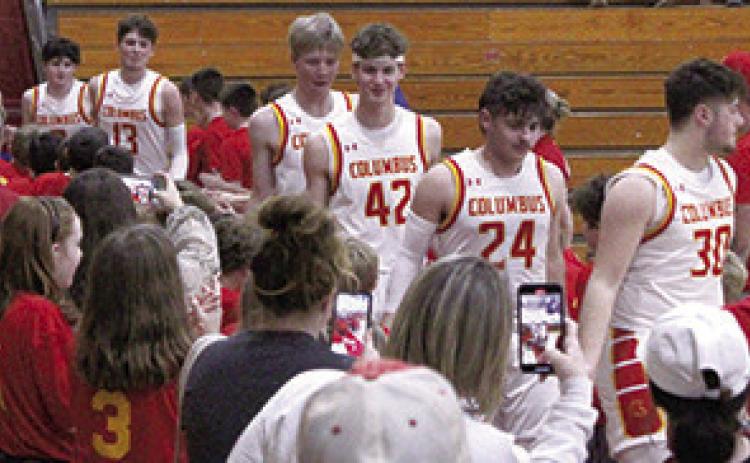 Players and parents of the Columbus Recreation Mini Basketball Teams welcomed the Titans back to the court following the introduction of the boys teams at the halftime break of the varsity game.