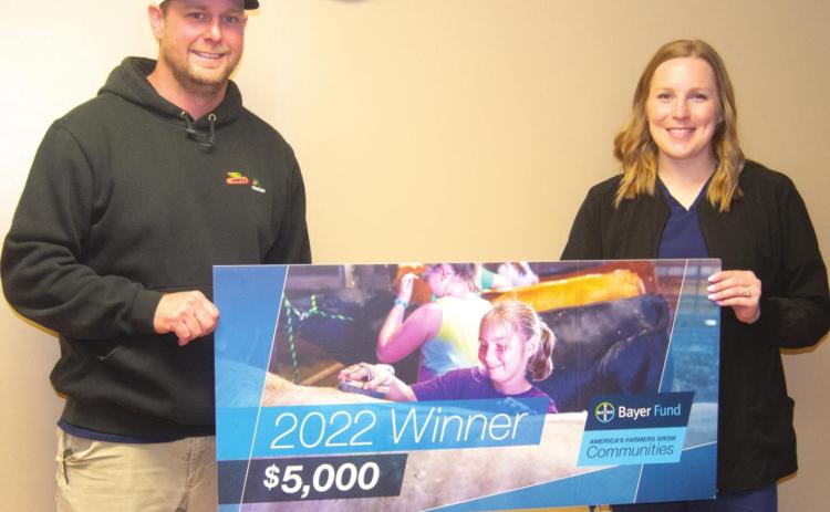 A $5,000 donation was given to Crain Farms